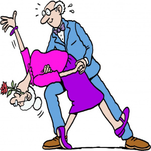 An elderly couple dressed up and dancing.